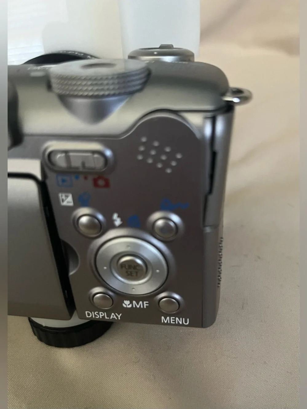 Canon PowerShot A620 digital camera with Photomed dental photography attachment